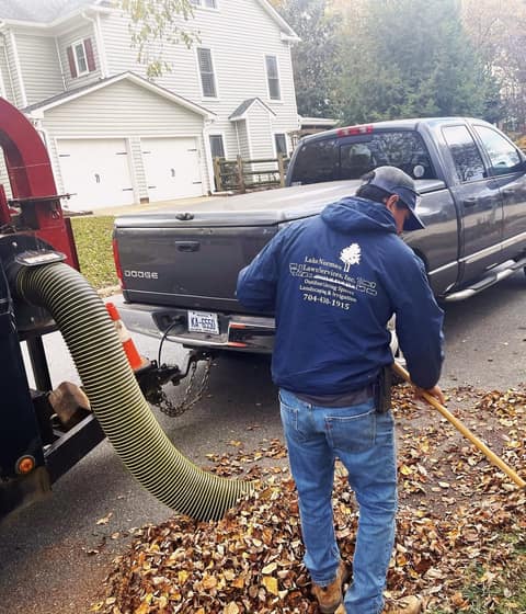 Leaf vacuum truck on a cleanup route
