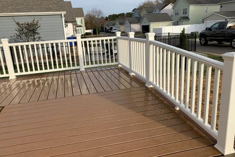 New brown composite deck with white railings